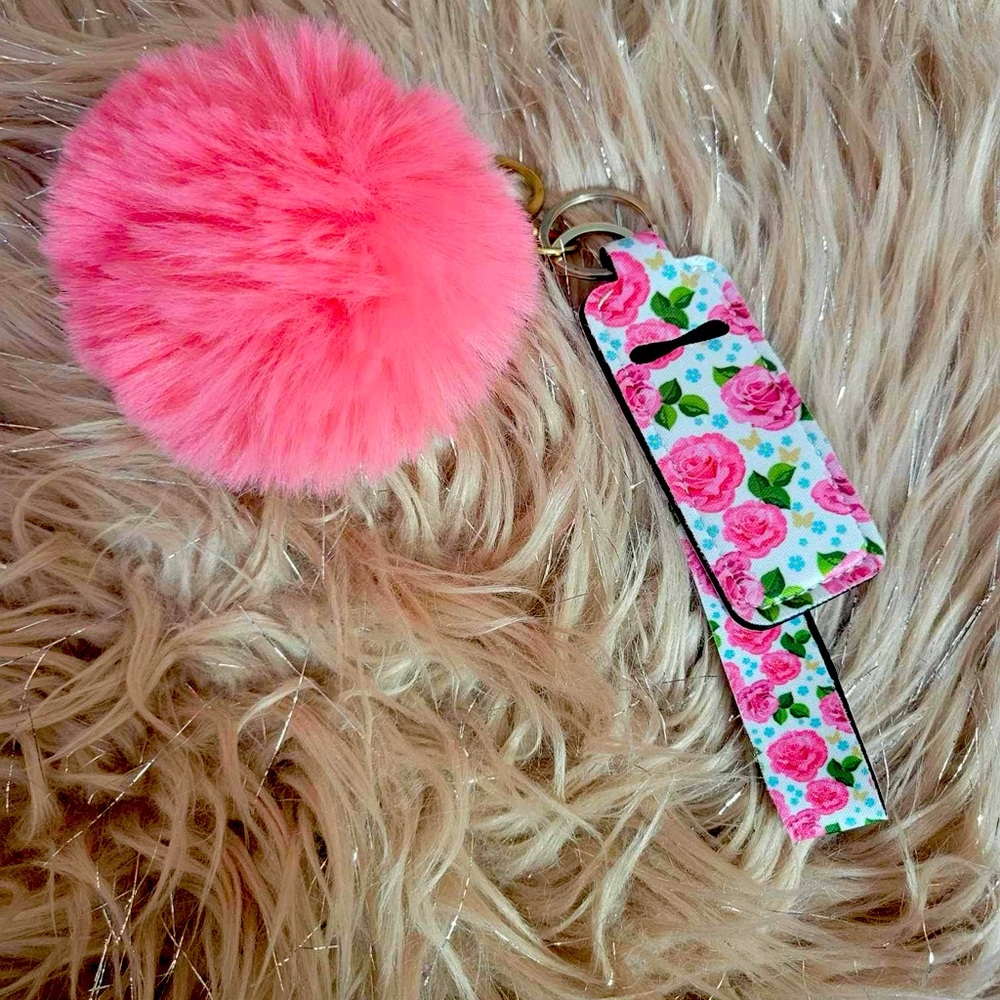 Pink rose chapstick holder wristlet with fuzzy ball